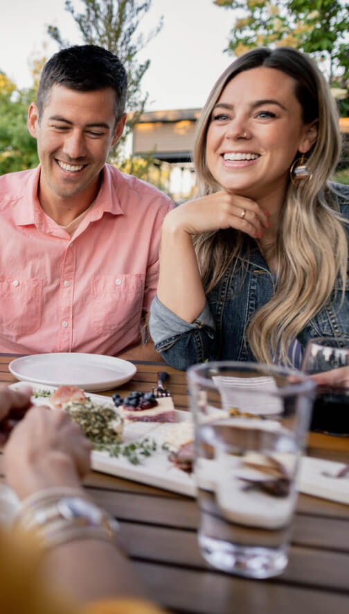 Image of couple eating dinner with friends at Bent Fork Grill