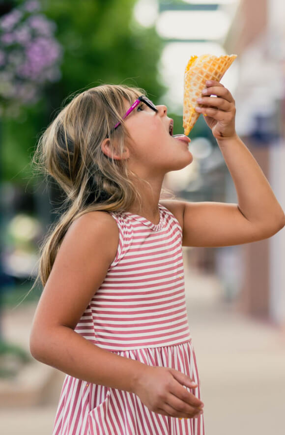 Image of child eating an ice cream cone