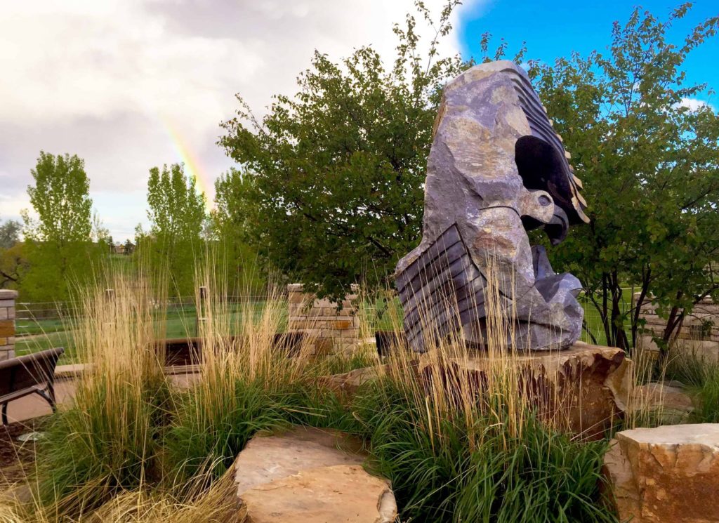 Image of a bird sculpture in Chapungu Park