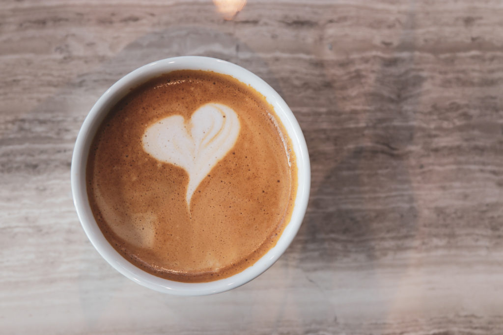 Image of a latte with a heart milk art