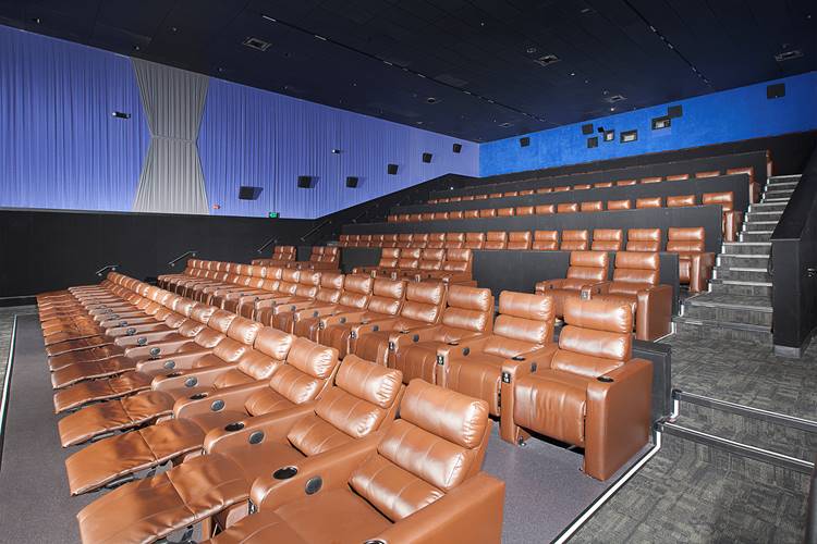 Interior image of Metrolux Theater with brown leather recliner seats