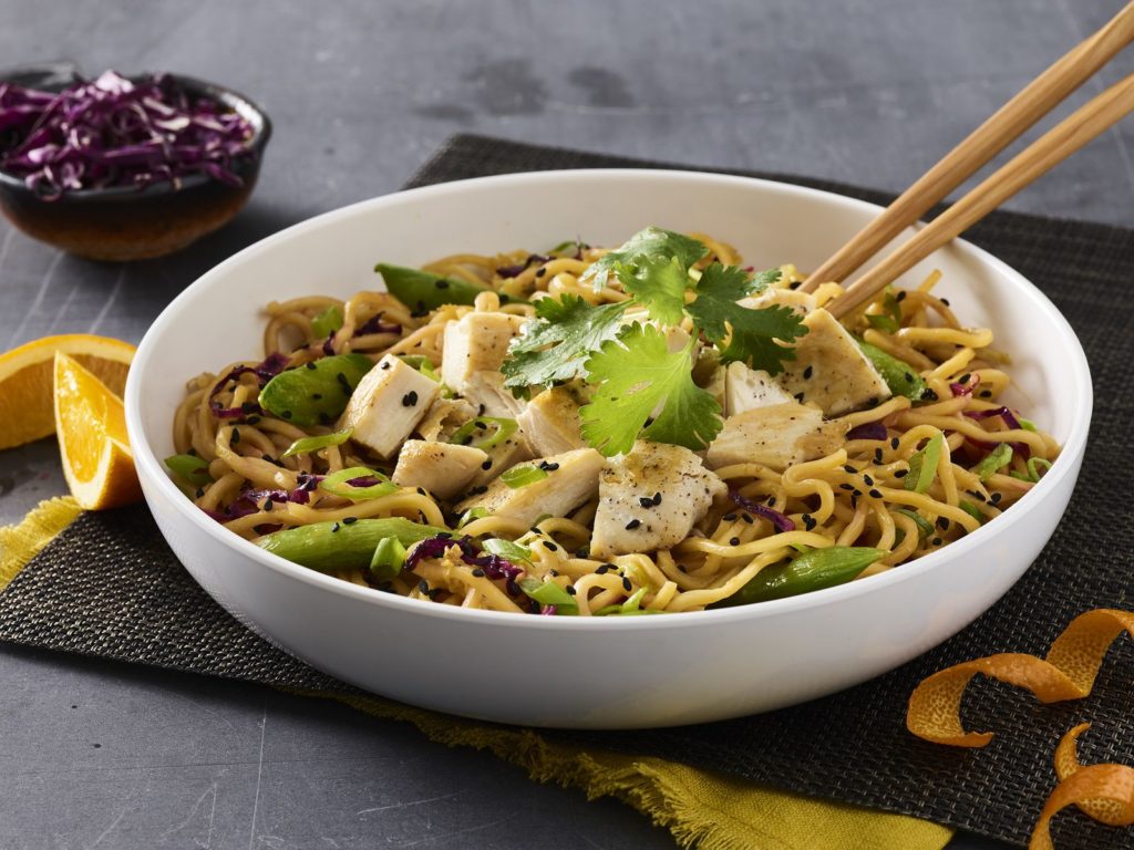 Image of a bowl of noodles with chicken from Noodles & Company restaurant