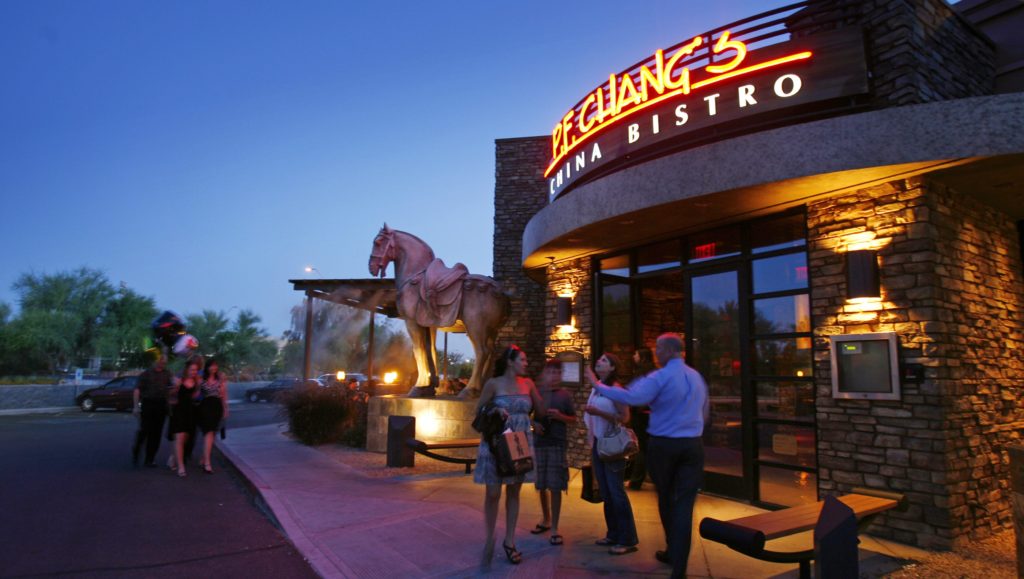 Exterior image of family outside of P.F. Chang's restaurant