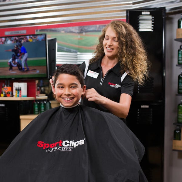 Image of boy getting his hair cut at Sport Clips