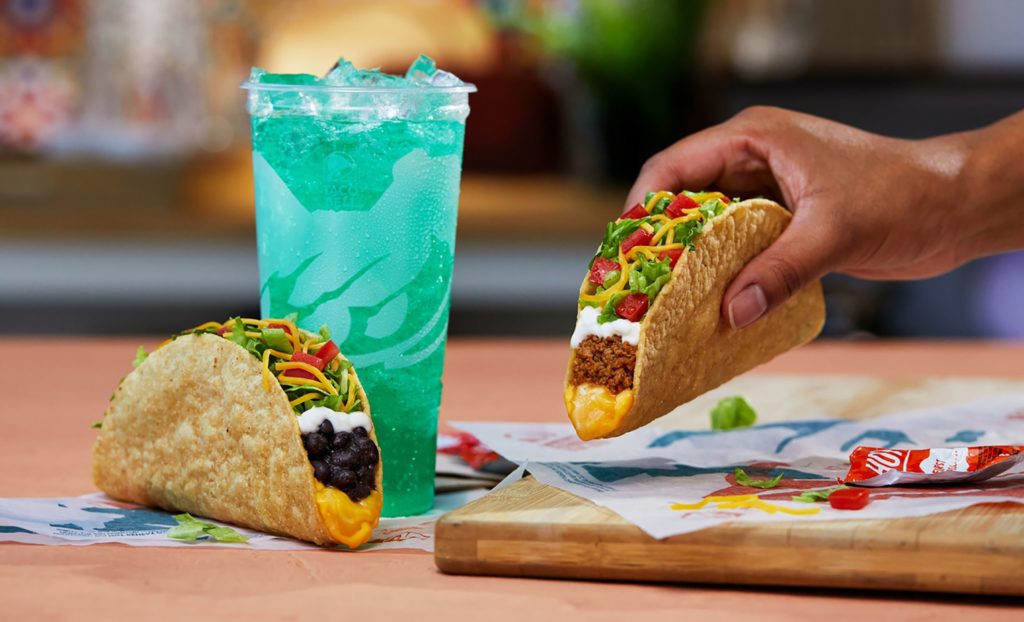 Image of two Taco Bell tacos and a drink