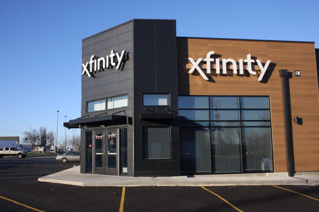 A shopping building with a sign that says xfinity.