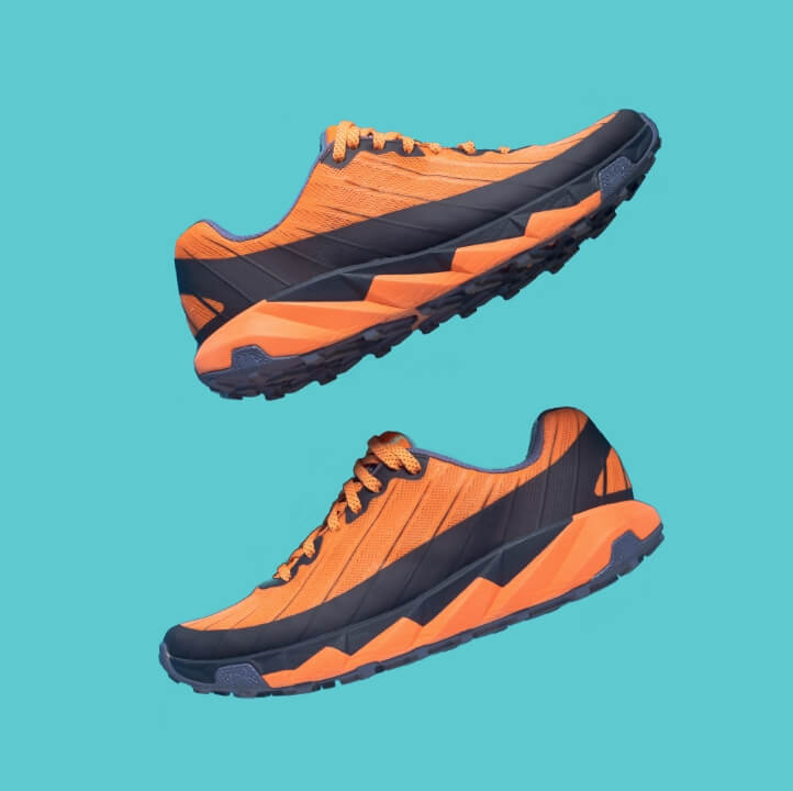 Image of orange and black running shoes