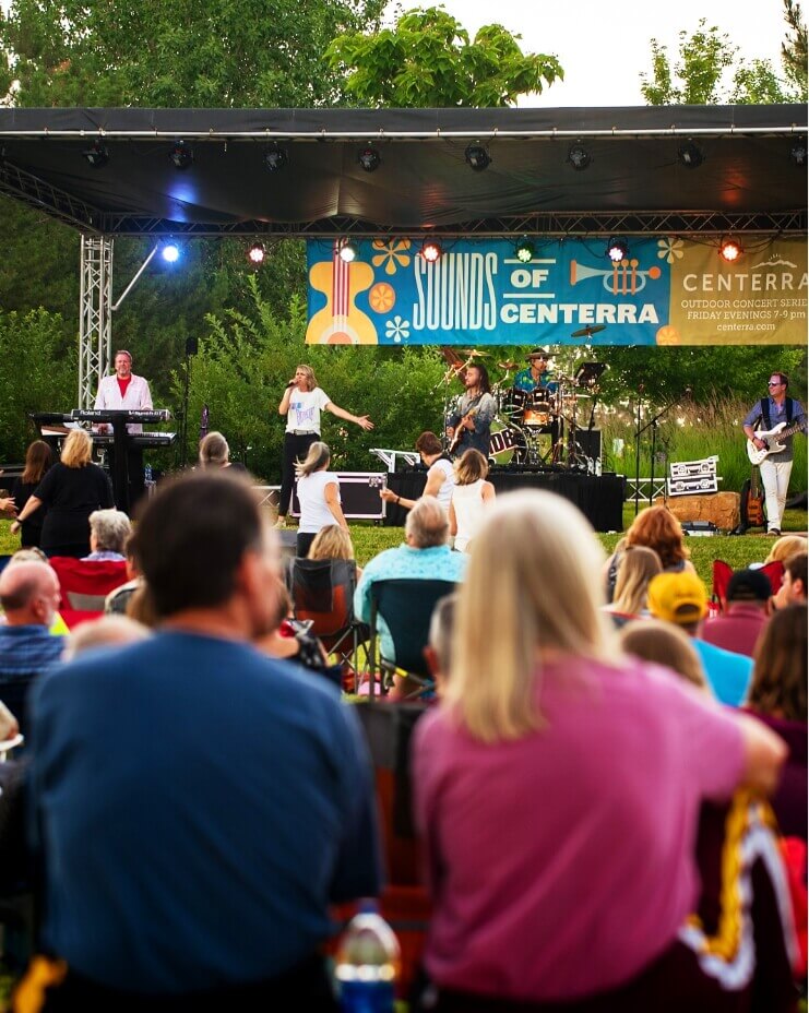 A crowd of people enjoying an outdoor concert in Northern Colorado.