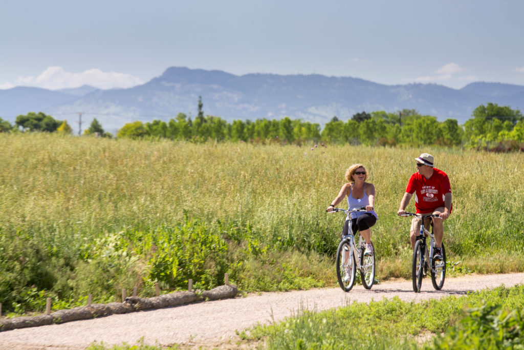 People on Bikes on a trail at Centerra