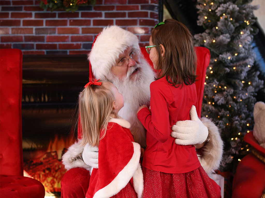 Girls talking to Santa