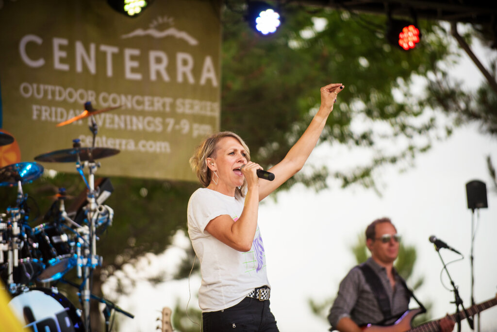 woman singing at concert