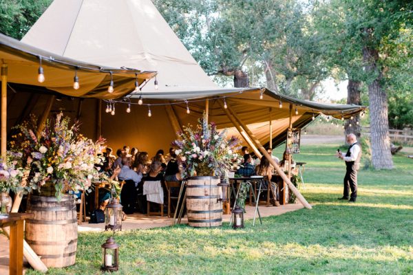A teepee tent set up for a certified wild wedding reception.