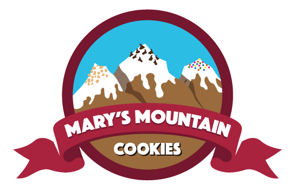 Mary's Mountain Cookies is a charming cookie bakery nestled in the picturesque town of Loveland, known for its delectable treats and stunning mountain views. Our logo perfectly encapsulates the cozy dining experience our
